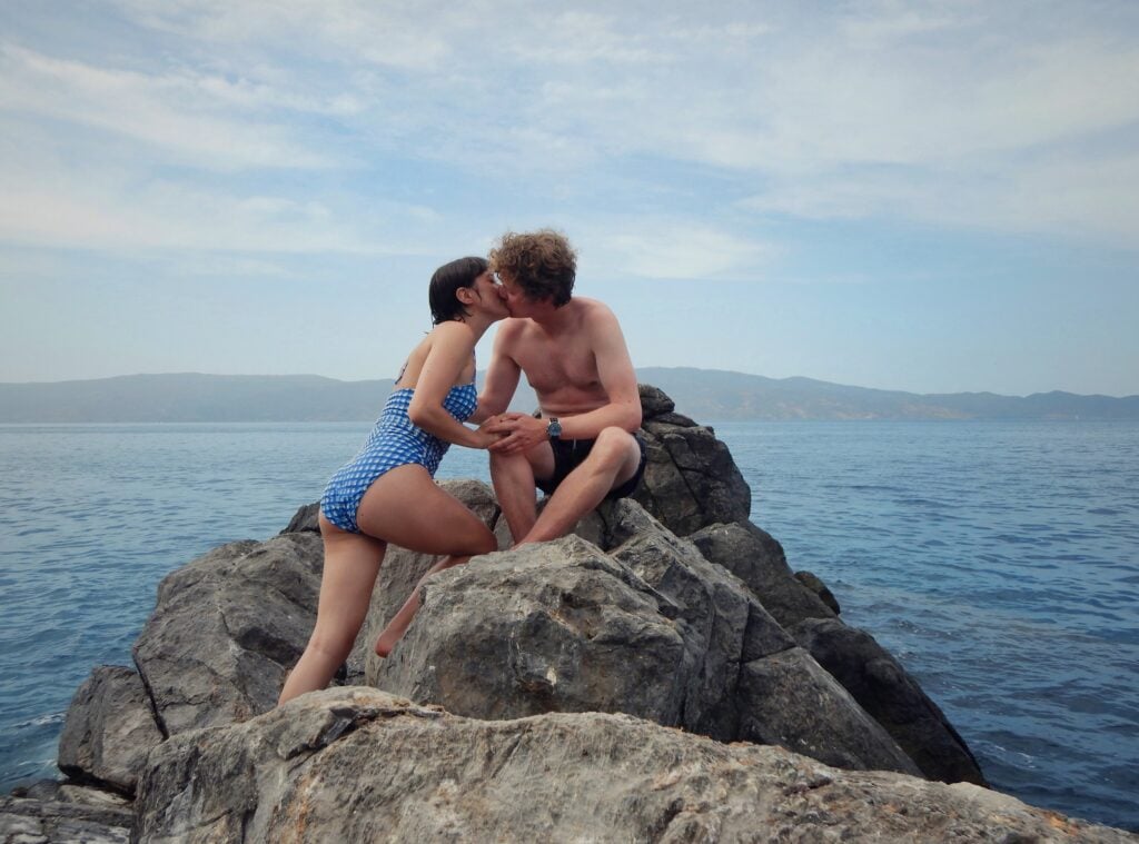 Romany Gilmour with boyfriend on a rock